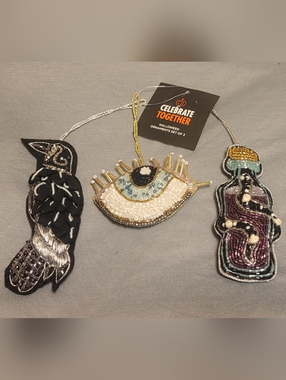 Beaded Ornaments With Eye, Raven, And Potion Bottle